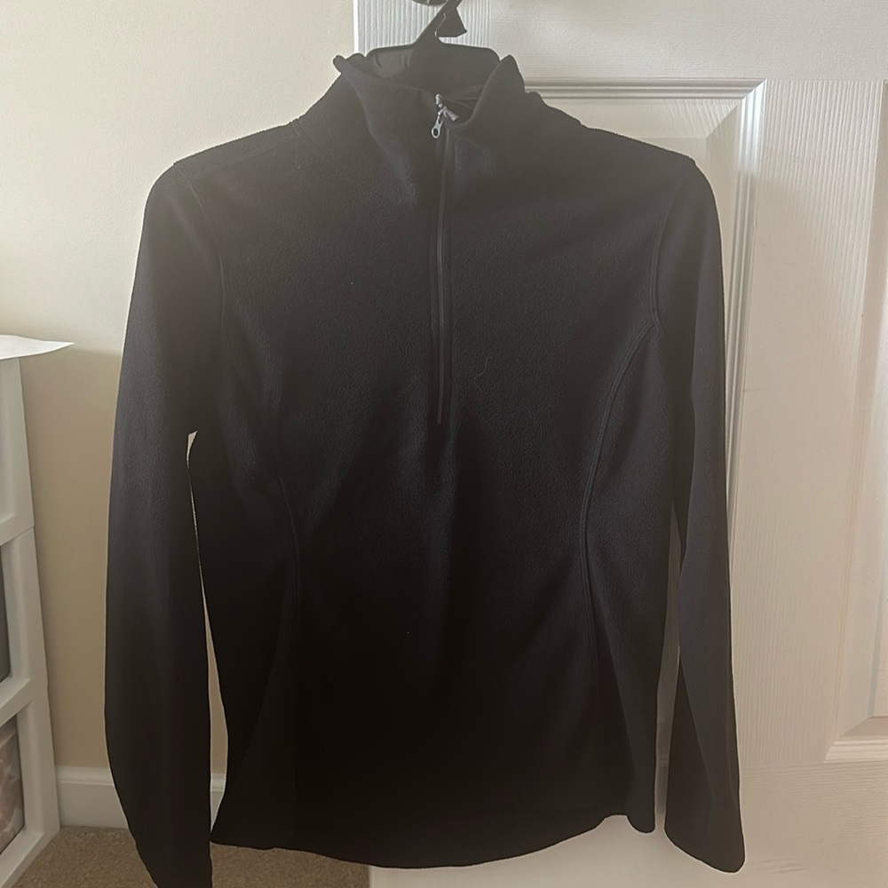 Black quarter zip with gymnastics on back